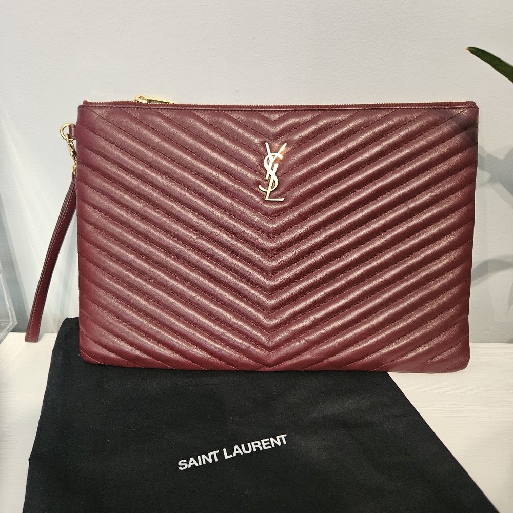 SAINT LAURENT The Cassandre Large Leather Zip Wristlet Pouch in Burgundy